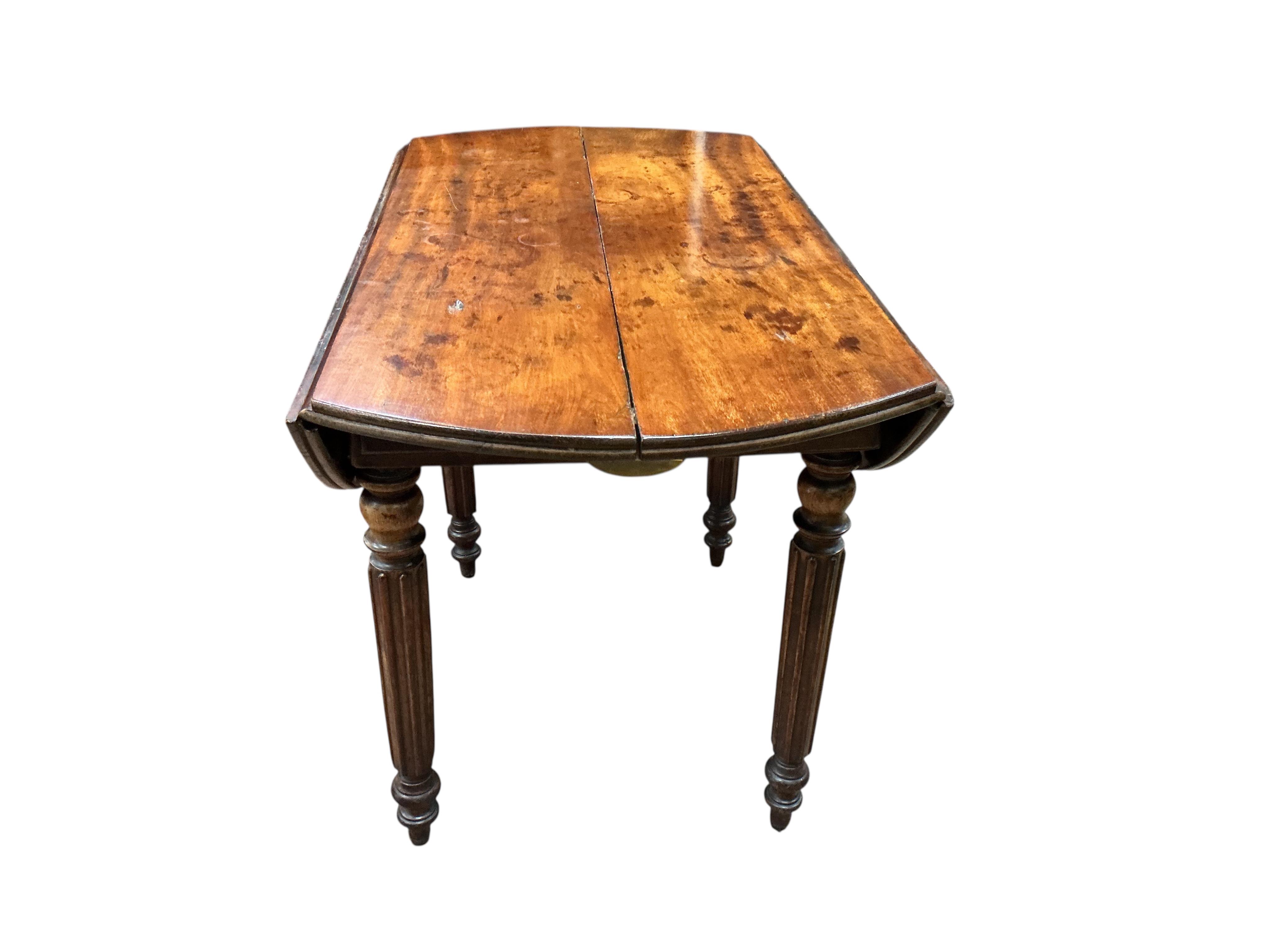 A 19th century French mahogany drop leaf extending dining table, 152cm extended, one spare leaf, depth 96cm, height 66cm